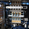 Máquina envasadora automática de llenado de múltiples líneas y sellado automático de bolsas pequeñas de aceite comestible con sellado en los cuatro lados
